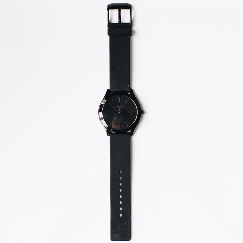 Michael Kors men’s black on black watch.
